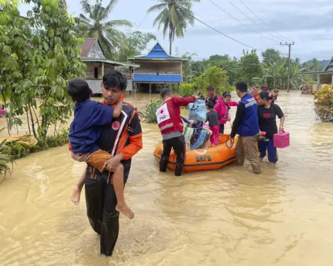 Flood and landslide hit Indonesia's Sulawesi island, killing 14