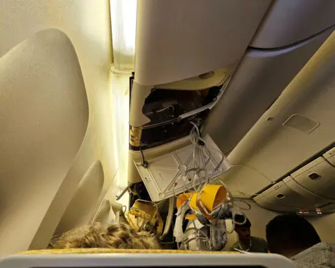 Singapore says investigators have data for flight hit by turbulence
