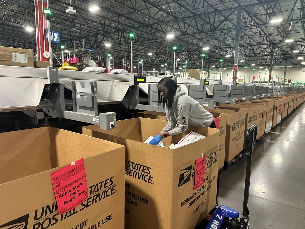 FILE PHOTO: Largest postal facility in the US gears up for the holiday season, in Los Angeles