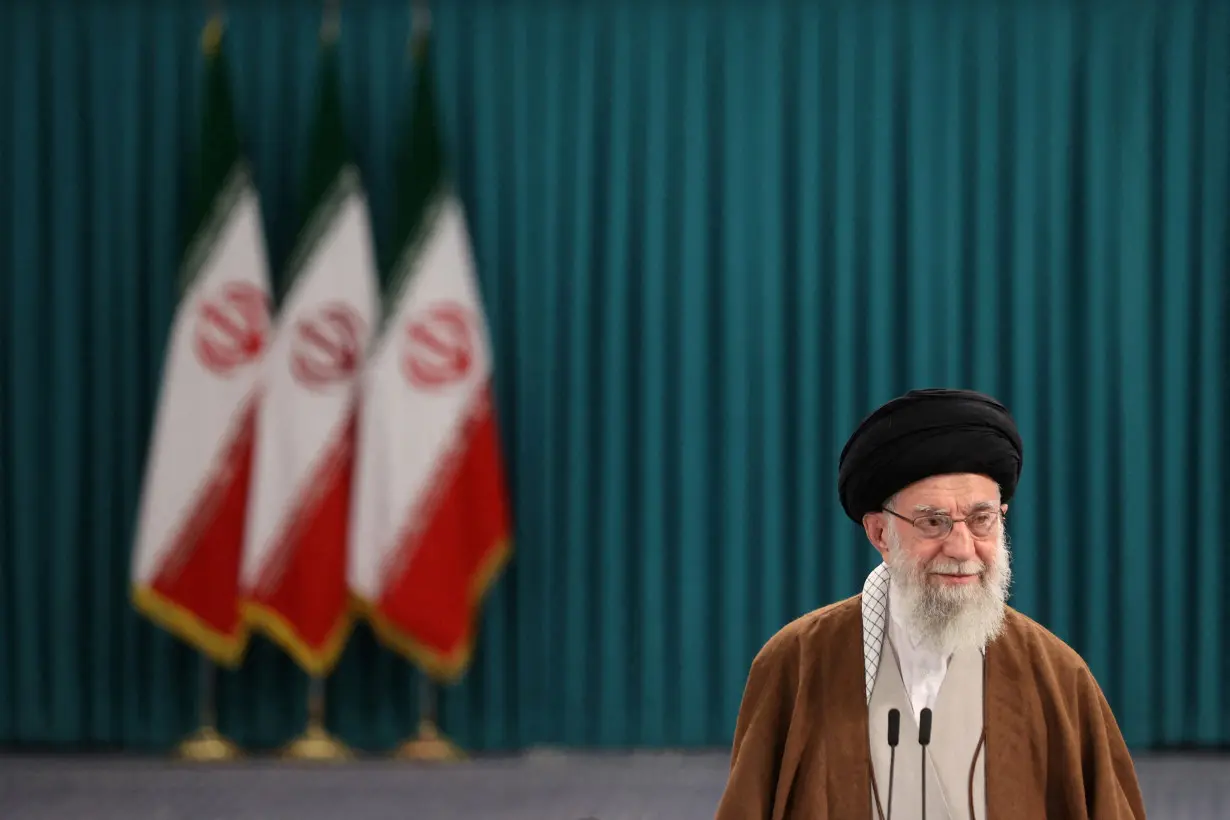 FILE PHOTO: Iran's Supreme Leader Ayatollah Ali Khamenei votes during runoff parliamentary election, in Tehran