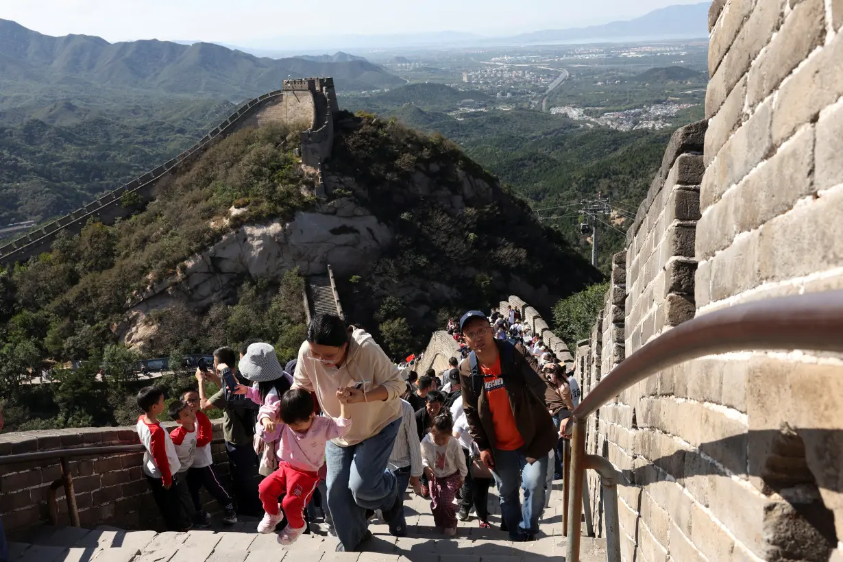 LA Post: China travel surges for May holiday but consumers remain wary