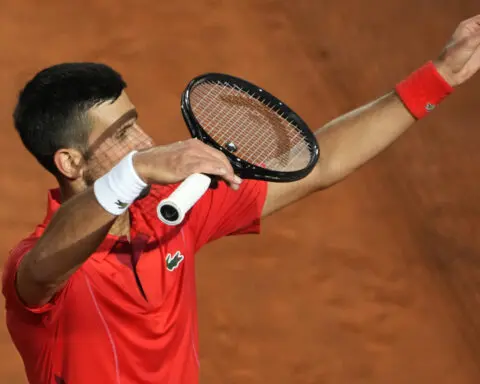 Djokovic says he's 'fine' after being hit on the head by a water bottle