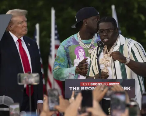 Trump appeared on stage at his Bronx rally with two rappers charged in a felony gang case