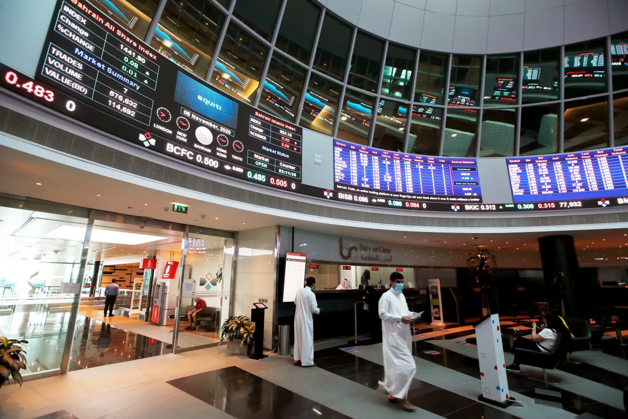 Traders wait at the Bahrain Bourse in Manama