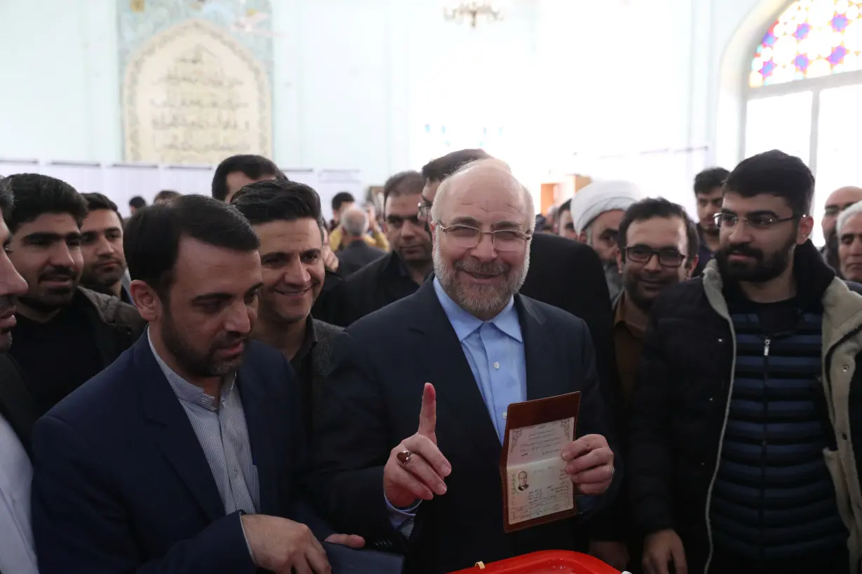 Mohammad Baqer Qalibaf, a parliamentary candidate, casts his vote at a mosque in downtown Tehran