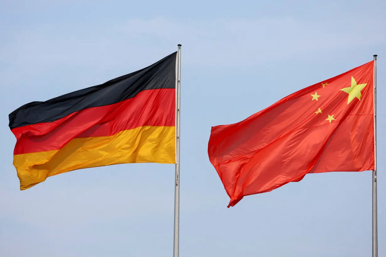 FILE PHOTO: The flags of Germany and China are seen ahead of a meeting between German Chancellor Olaf Scholz and Chinese Premier Li Qiang in Berlin,