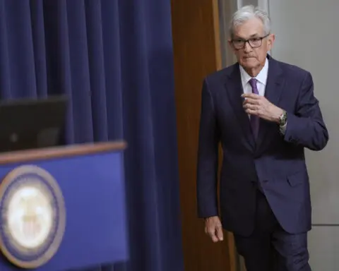 Federal Reserve says interest rates will stay at two-decade high until inflation further cools