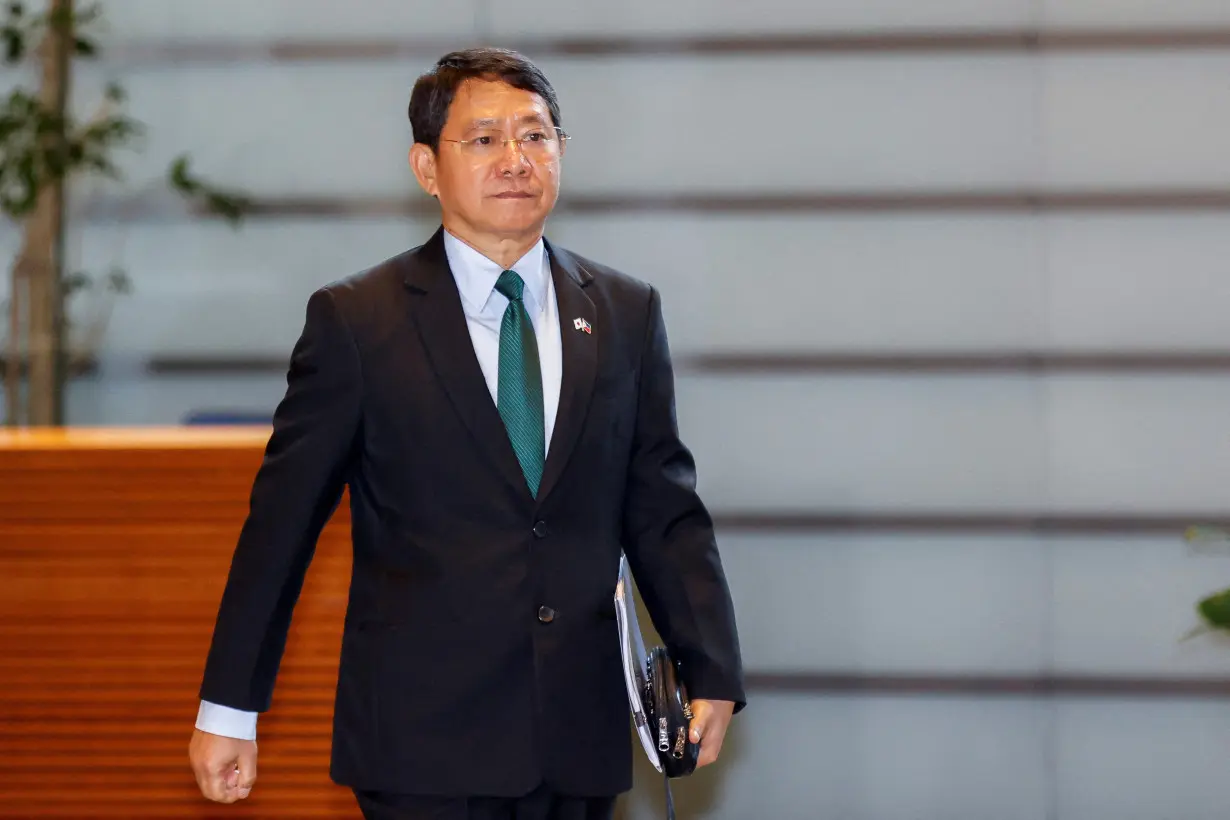 FILE PHOTO: Philippine National Security Adviser Eduardo Ano arrives to meet Japanese Prime Minister Fumio Kishida at the prime minister's office in Tokyo