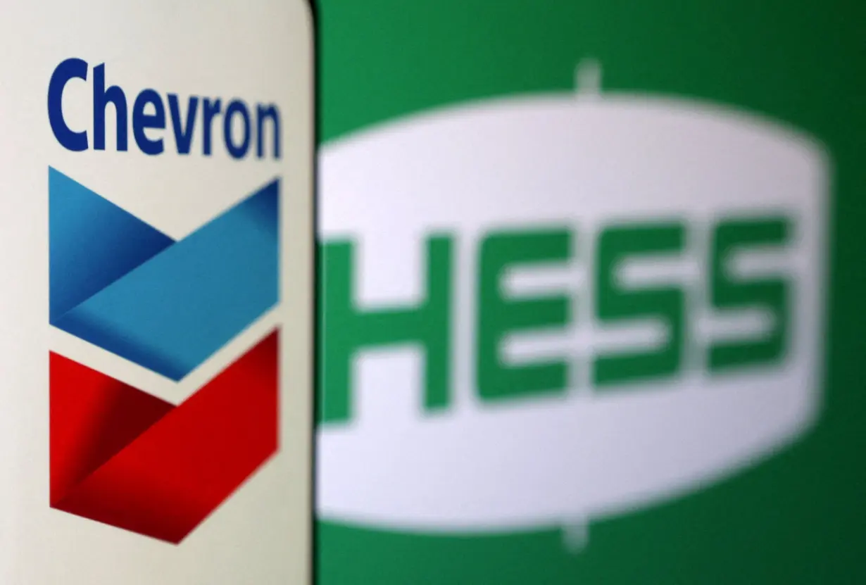 FILE PHOTO: Illustration shows Chevron and Hess logos