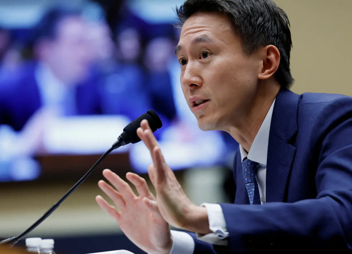 FILE PHOTO: TikTok Chief Executive Shou Zi Chew testifies before a House Energy and Commerce Committee, in Washington