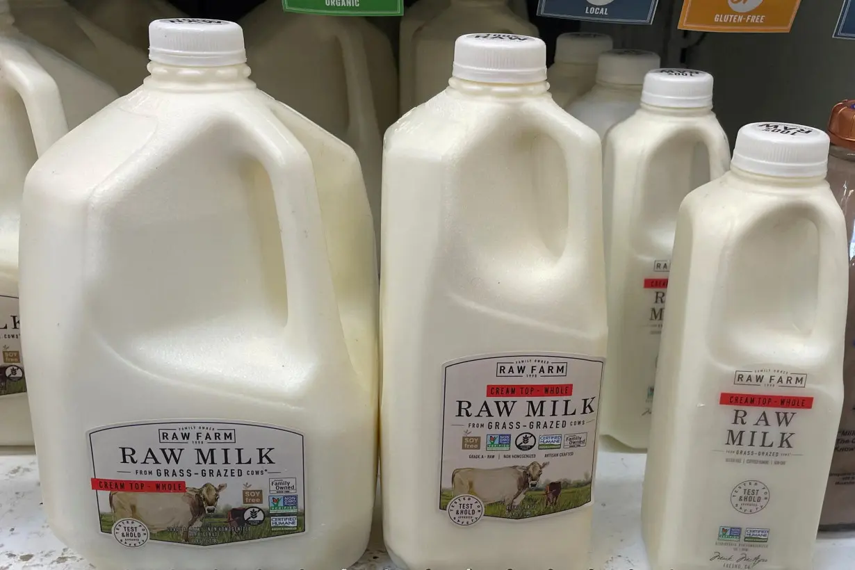 FILE PHOTO: Bottles of raw milk are seen in a display in a Sprouts Farmers Market store in Los Angeles