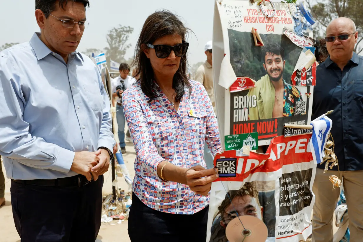 FILE PHOTO: Former Republican presidential contender Nikki Haley and Israeli lawmaker Danny Danon visit the site of the Nova festival, in Reim