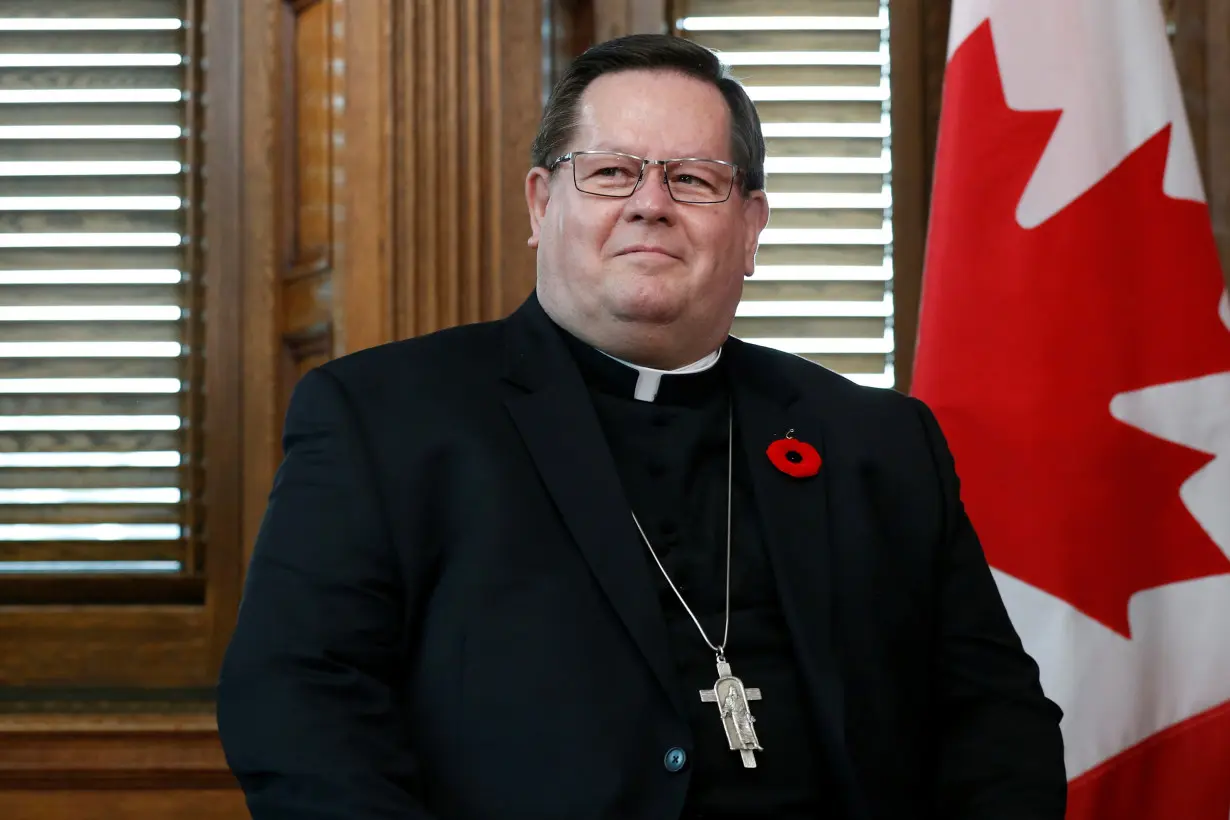 Cardinal Gerald Lacroix, Archbishop of Quebec, takes part in a meeting on Parliament Hill in Ottawa