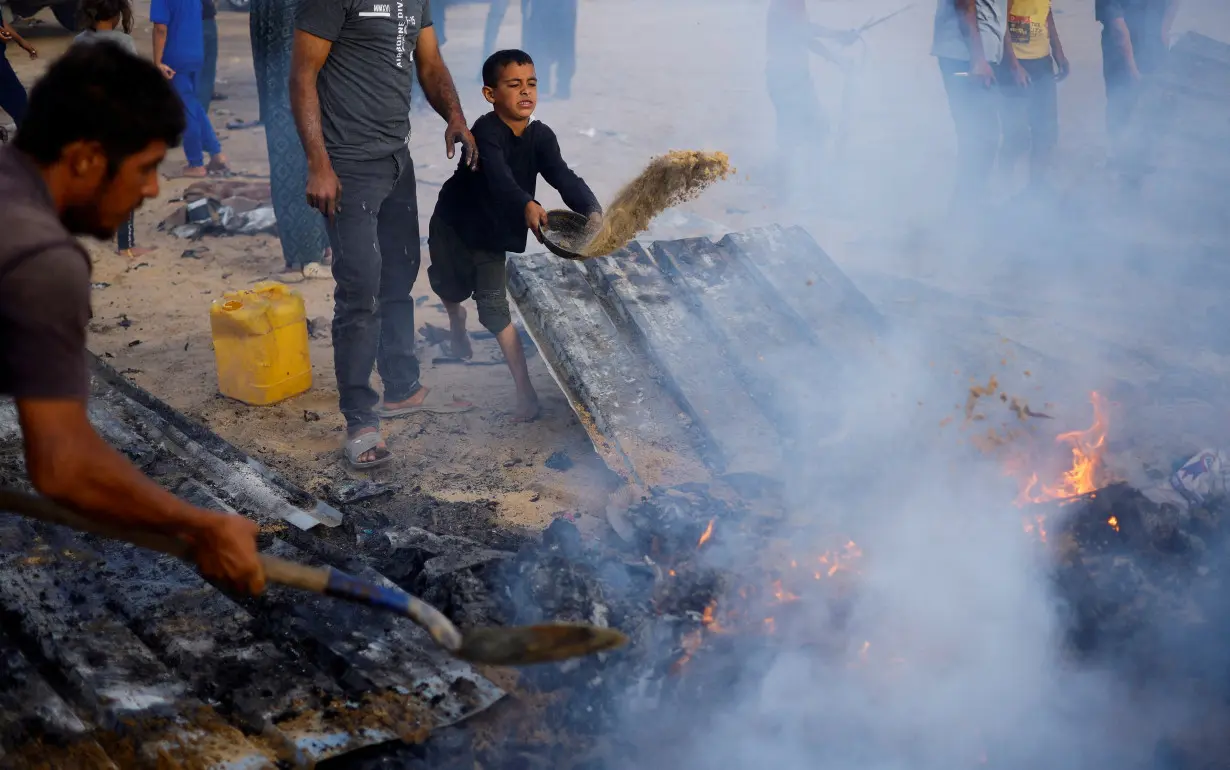 Aftermath of an Israeli strike on an area designated for displaced people, in Rafah in the southern Gaza Strip