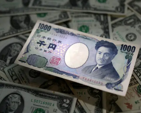 Japan's yen falls to 1990 lows, dollar/yen nears 155