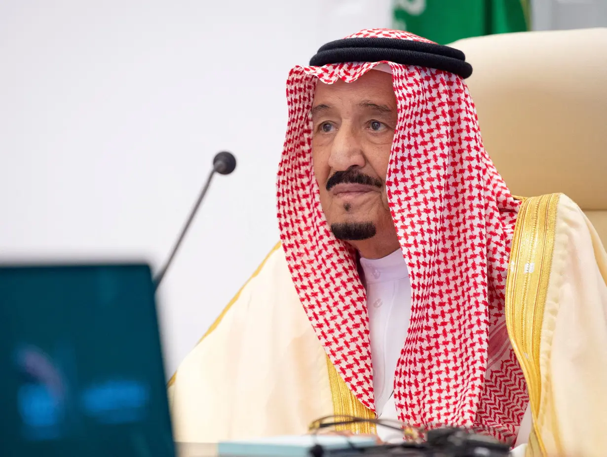 Saudi King Salman bin Abdulaziz gives virtual speech during the 15th annual G20 Leaders' Summit in Riyadh, Saudi Arabia