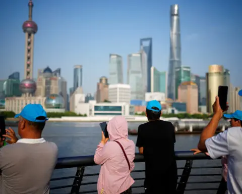 Shanghai lowers home downpayments, eases buying curbs