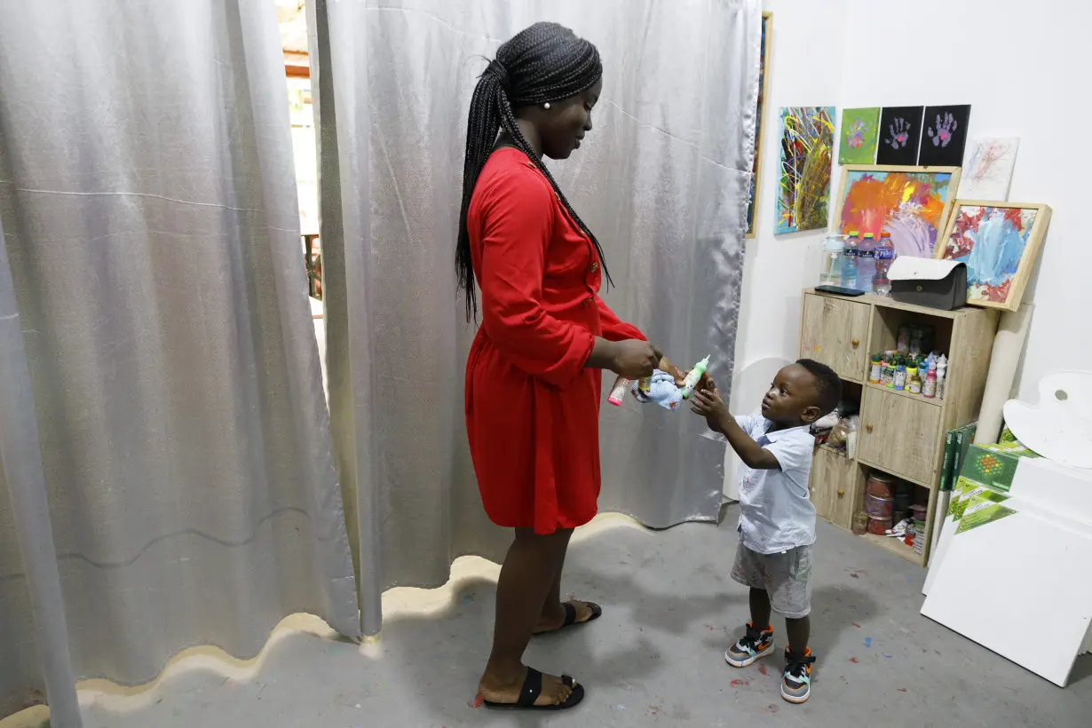 A Ghana toddler sets a world record as the youngest male artist. His mom says he just loves colors