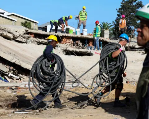 Rescue efforts halted after South African building collapse where 33 died