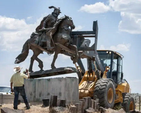 Civil suit settled in shooting of Native American activist at protest of Spanish conquistador statue