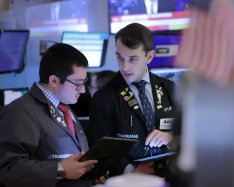 Wall St closes lower; gold climbs amid economic, geopolitical crosswinds