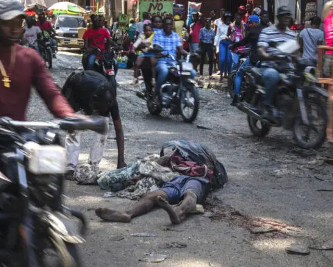 Haitians demand the resignation and arrest of the country's police chief after a new gang attack