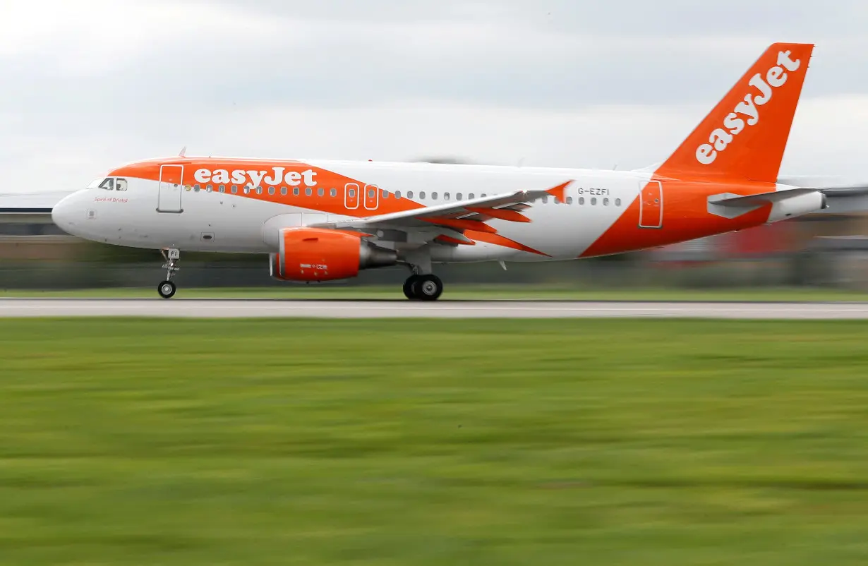 FILE PHOTO: An Easyjet Airbus aircraft takes off from the southern runway at Gatwick Airport in Crawley