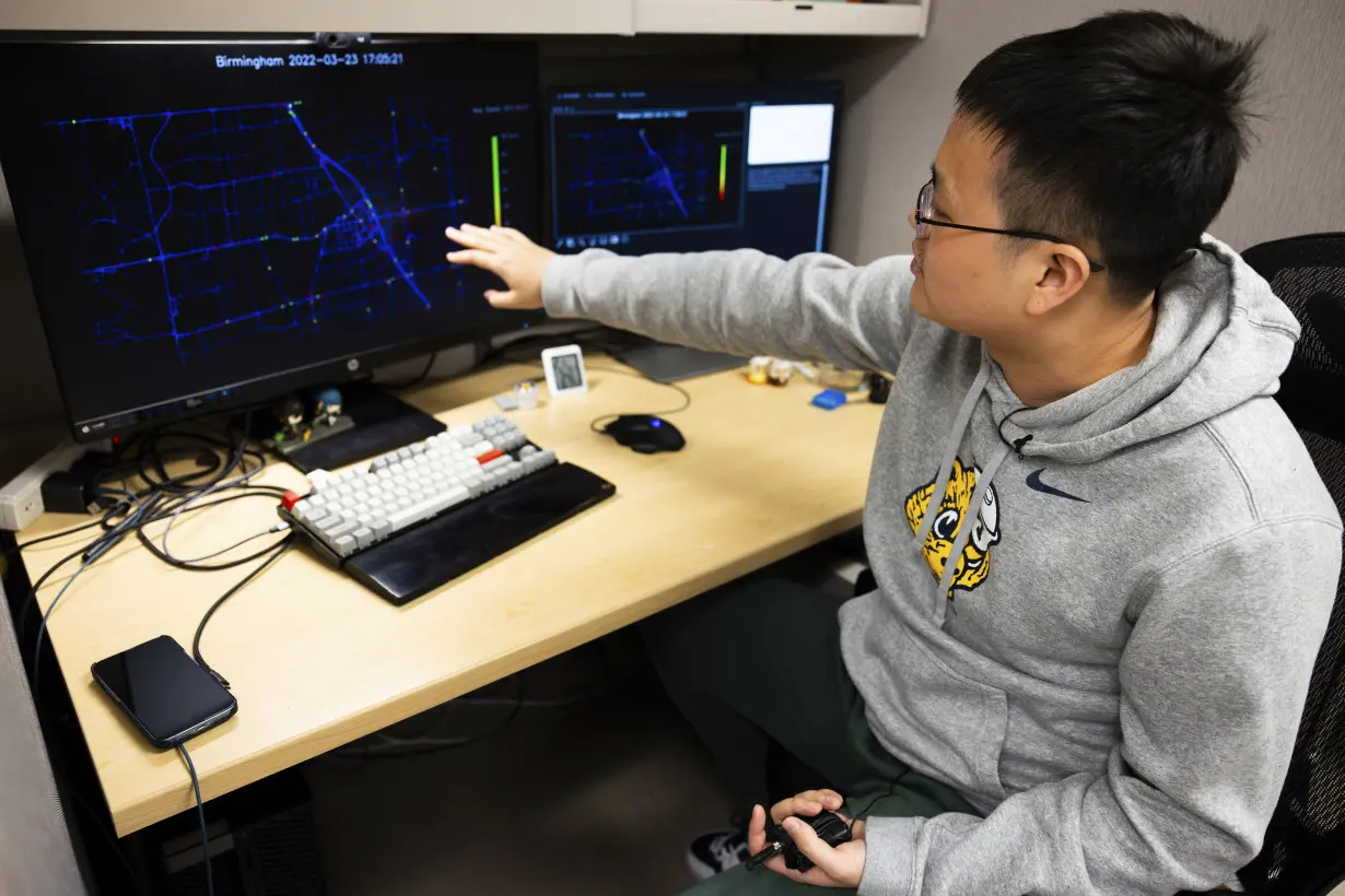 Red, yellow, green ... and white? Smarter vehicles could mean big changes for the traffic light