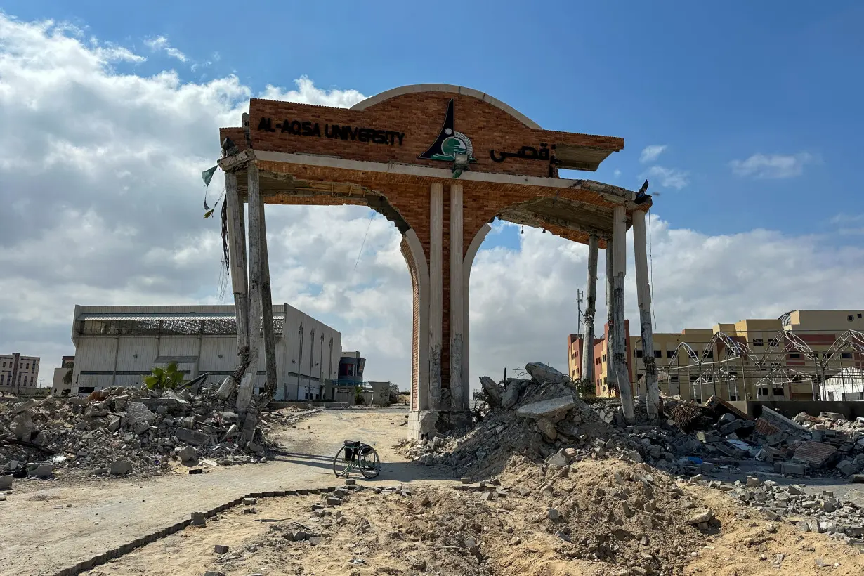 A damaged gate of Al-Aqsa university, which was destroyed during Israel's military offensive, stands in Khan Younis in the southern Gaza Strip