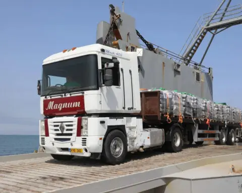 Trucks are rolling across a new US pier into Gaza. But challenges remain to getting enough aid in