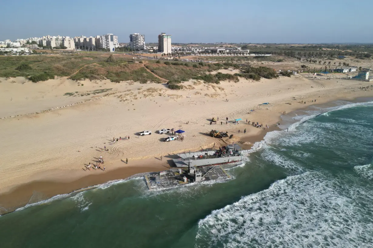 Vessels used for delivering aid to Gaza via U.S.-built pier run aground in Ashdod