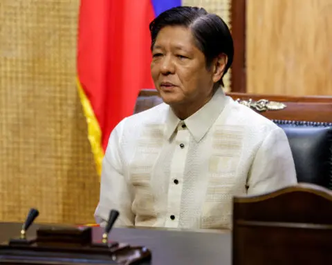 Philippines says won't raise South China Sea tensions, won't use water cannons