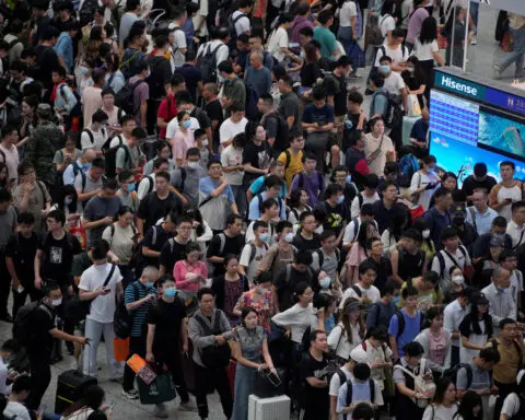 Holidays at home for record number of Chinese as economic slowdown bites