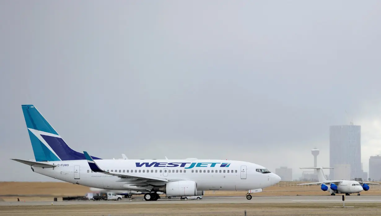 FILE PHOTO: A Westjet Boeing 737-700 takes off at the International Airport in Calgary