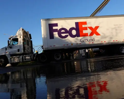 FedEx stock leaps on upbeat profit target, possible freight unit sale