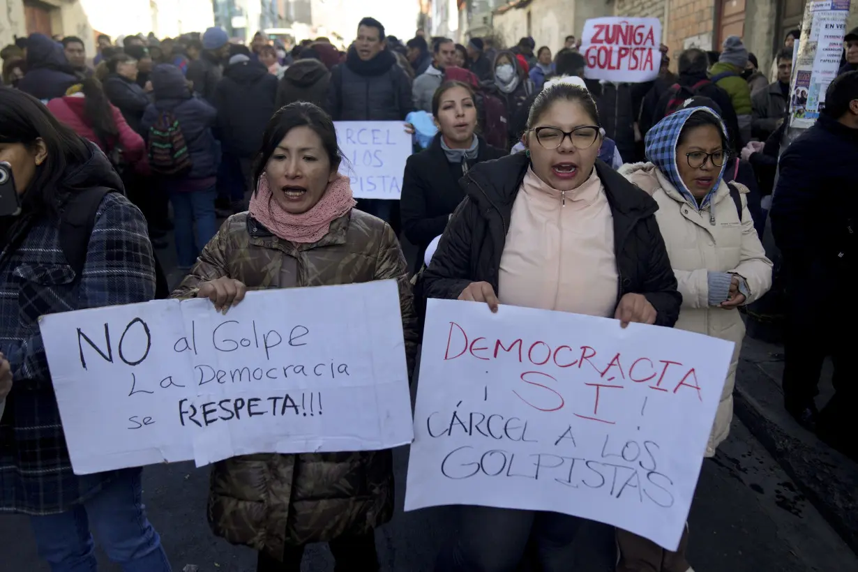 Bolivia’s president lambasts accusations of a self-coup as 'lies' as his supporters rally