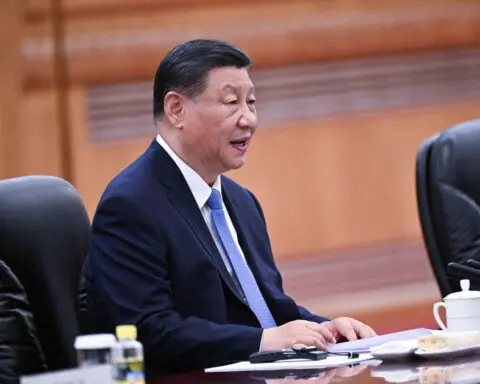 China's Xi calls for 'bridges' amid trade, diplomatic frictions
