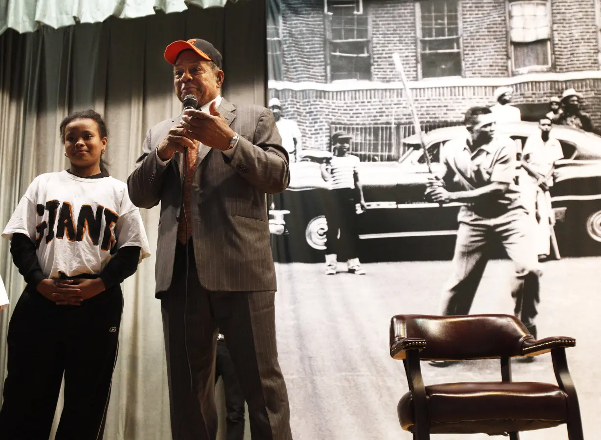 San Francisco Giants Hall of Fame baseball player Willie Mays speaks with students from PS 46 the Arthur Tappan School in New York