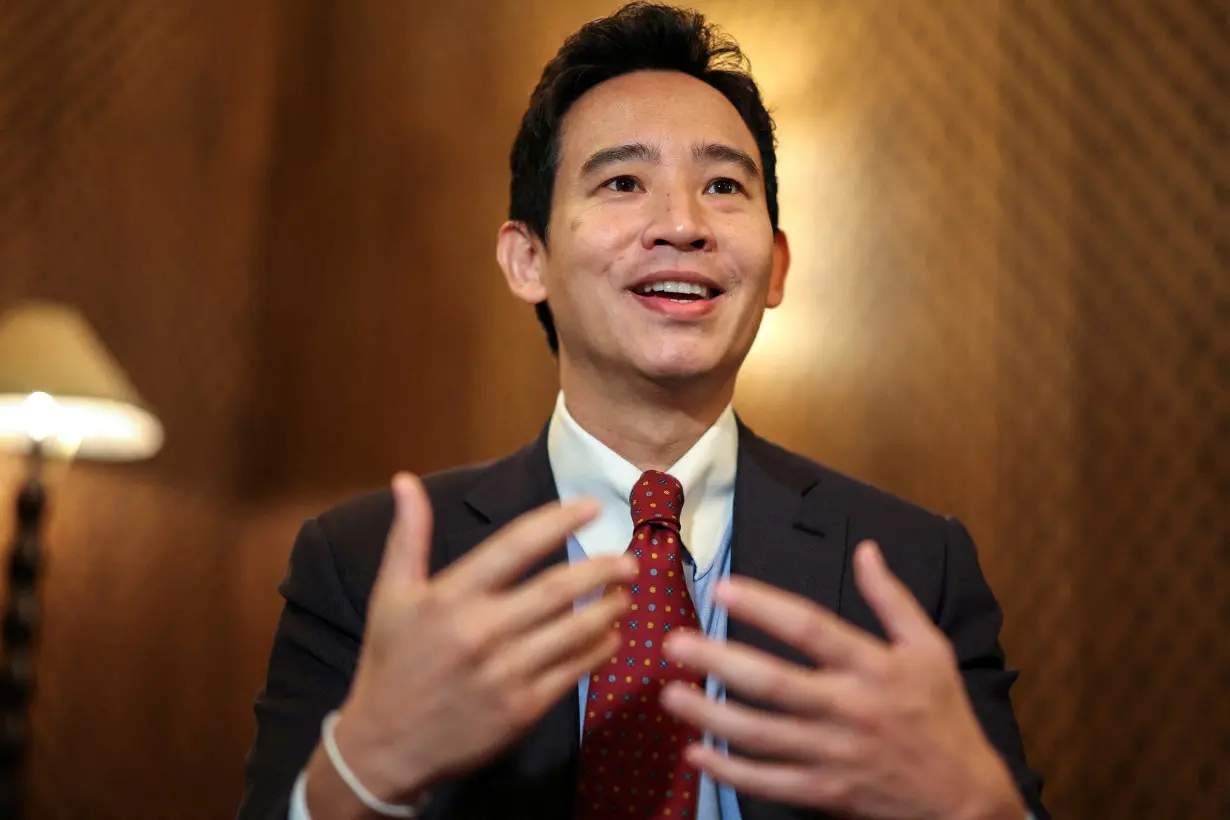 Former Move Forward Party leader Pita Limjaroenrat gestures during an interview with Reuters in Bangkok