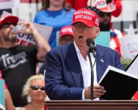 Trump tells sweltering rally in Nevada he won't tax tips