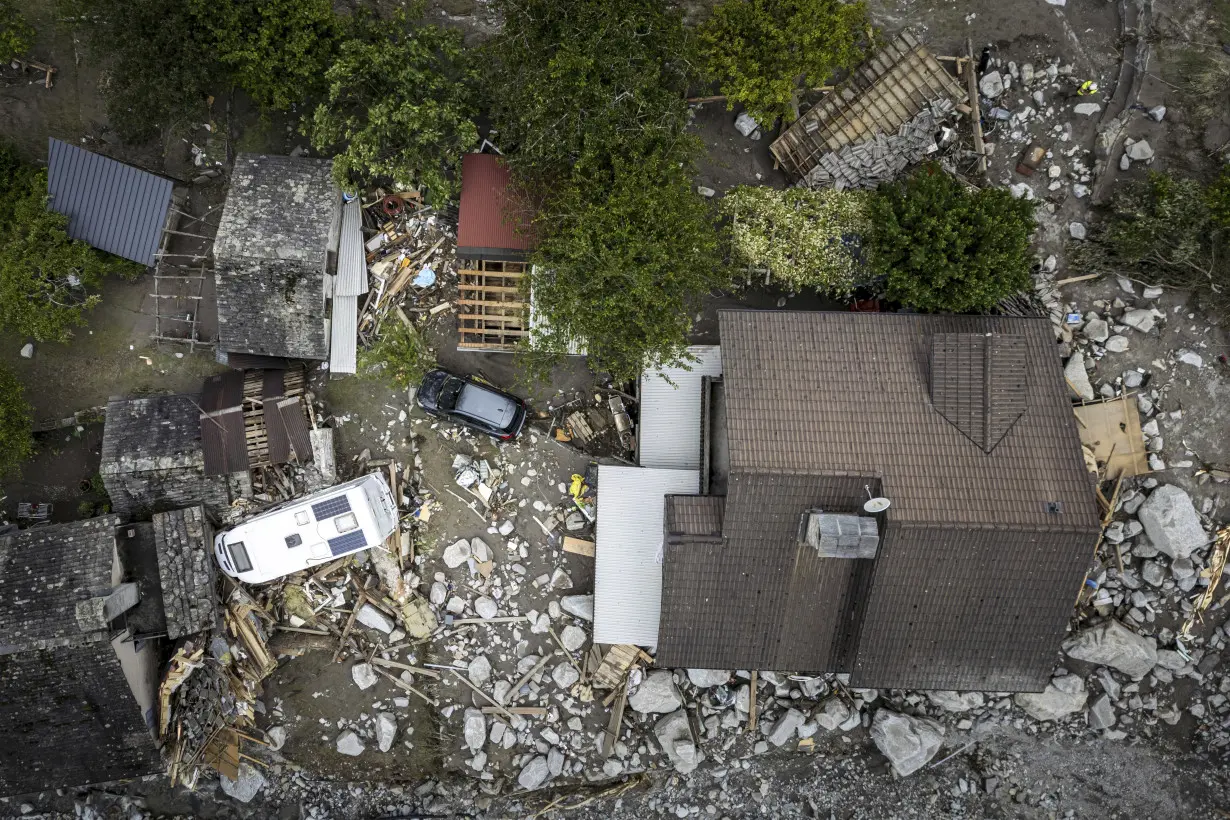 1 person found dead and 2 still missing after floods, rockslide hit a Swiss Alpine village