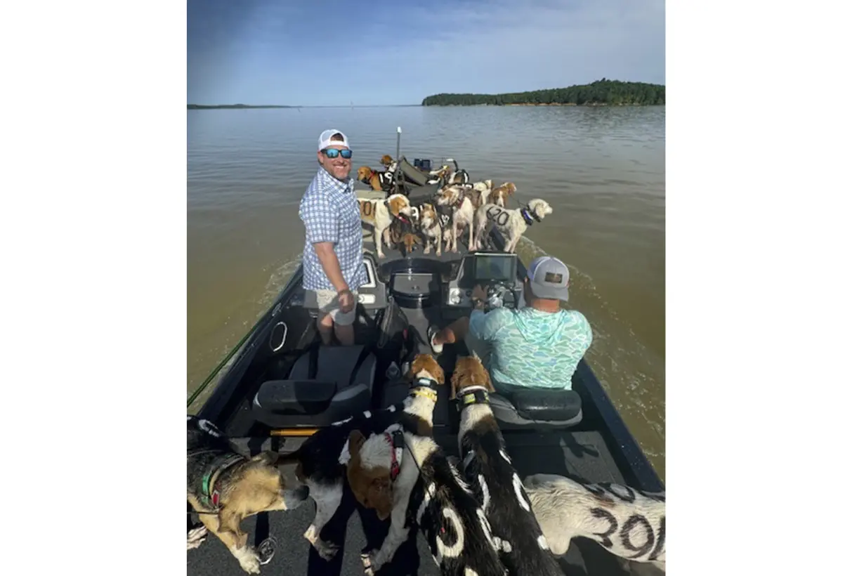 CORRECTION 38 Dogs Rescued From Lake