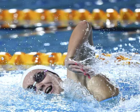 Titmus sets a women’s 200-meter freestyle world record at Australia’s Olympic swimming trials