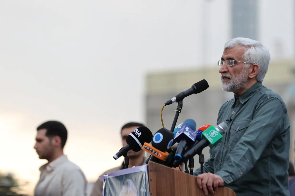 Iranian presidential candidate Saeed Jalili speaks during a campaign event in Tehran
