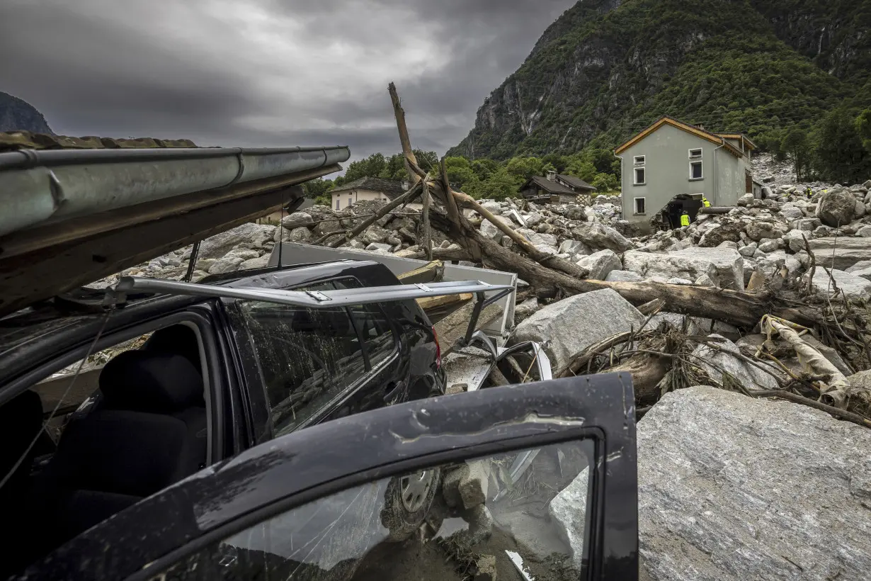 1 person found dead and 2 still missing after floods, rockslide hit a Swiss Alpine village