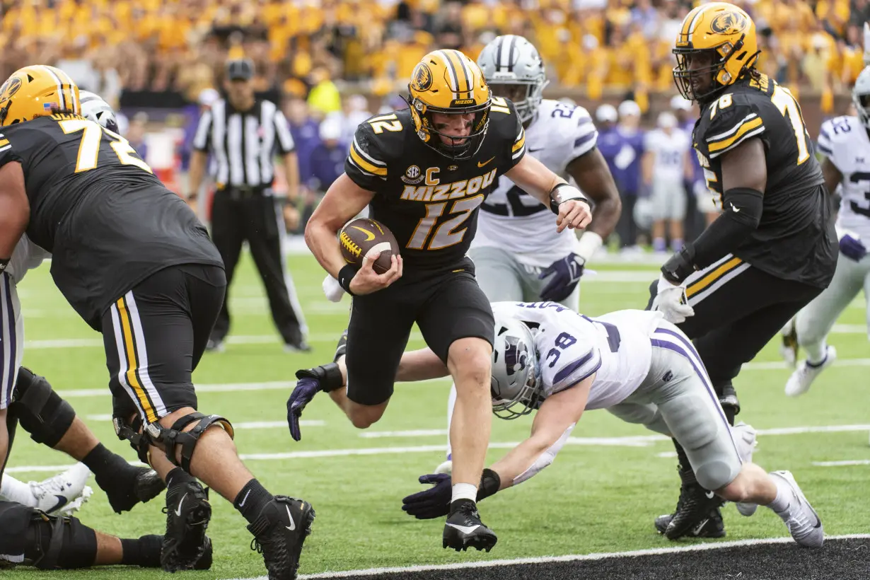 Missouri quarterback Brady Cook endures the home boos and keeps the Tigers on an unbeaten roll