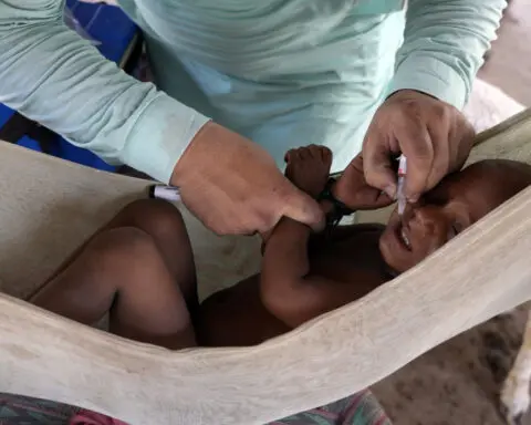 Gunmen kill a police officer assigned to protect polio workers in Pakistan’s northwest