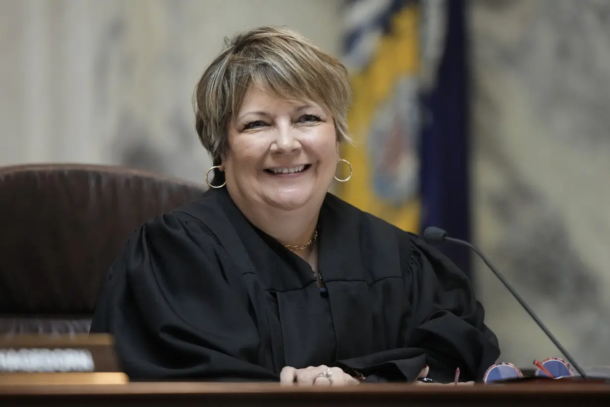 A member of the secret panel studying Wisconsin Supreme Court justice's impeachment backed her rival