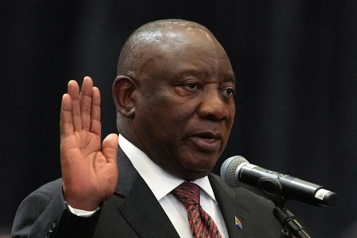 FILE PHOTO: South African President Cyril Ramaphosa is sworn into the National Assembly during the first sitting of the National Assembly following elections