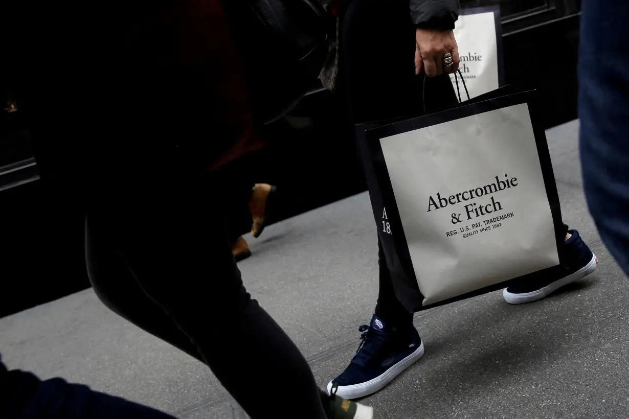 FILE PHOTO: A person carries a bag from the Abercrombie & Fitch store on Fifth Avenue in Manhattan, New York City, U.S.